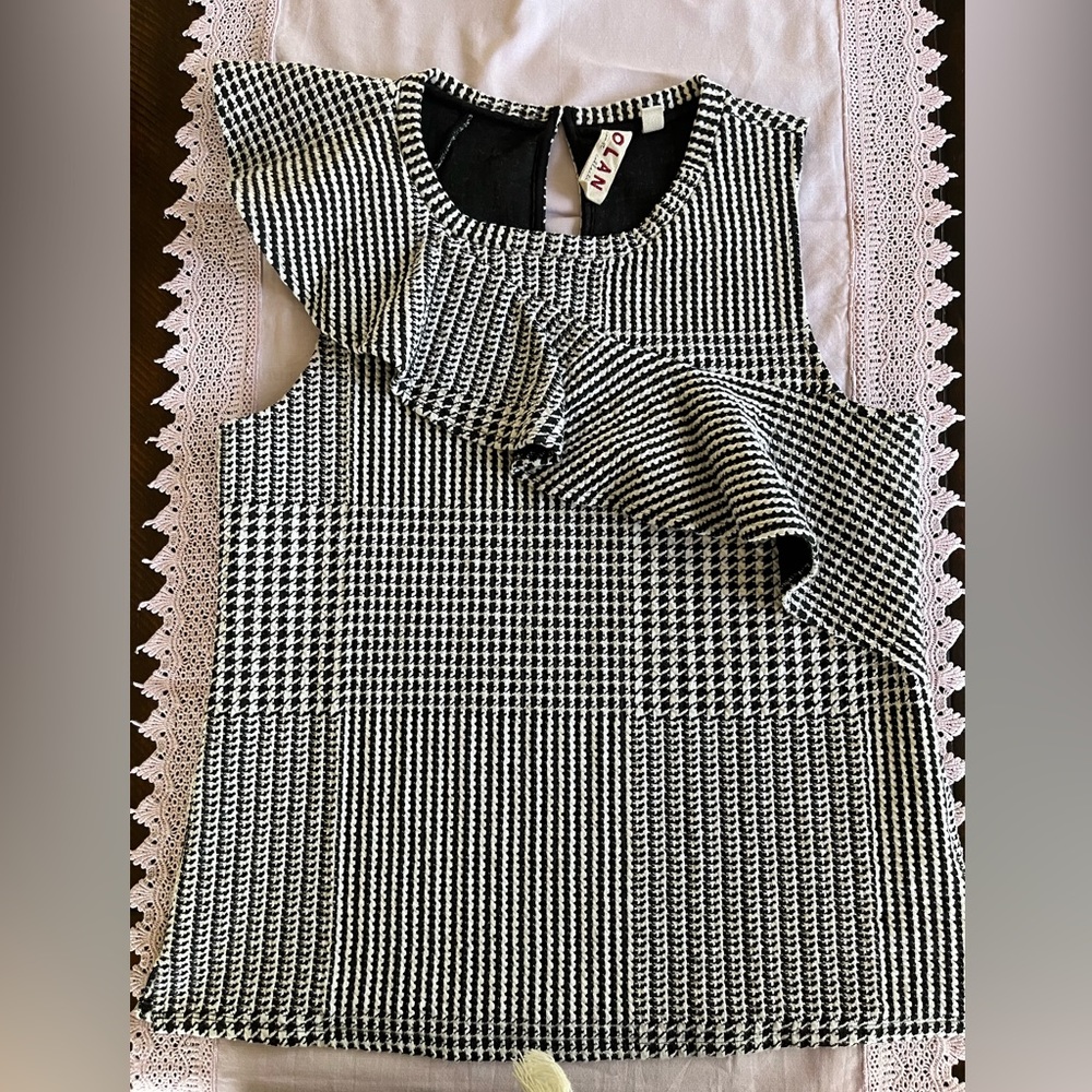 Dolan brand, never worn, purchased from Anthropologie, fits small to medium